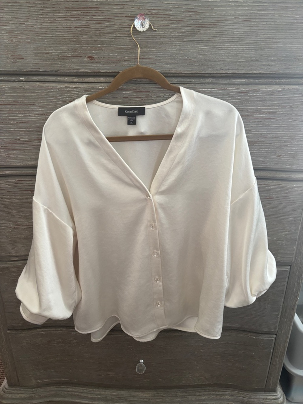 Karen Kane Lantern Sleeve crystal rhinestone button satin top.